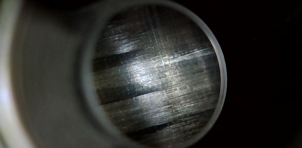 Borescope images showing the lands and grooves of a barrel throat.